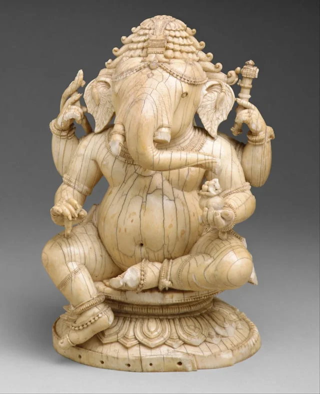 Ganesha statue modak,